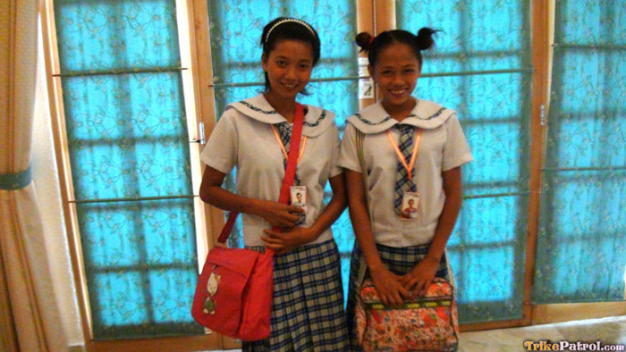 Filipina schoolgirls in uniform pose
